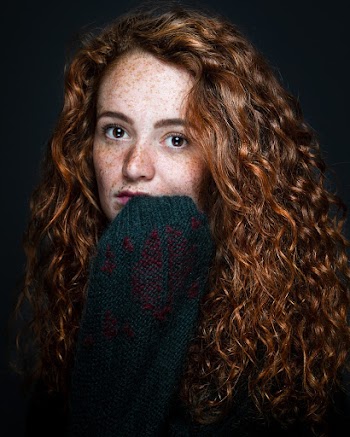 Woman With Curly Blonde Hair