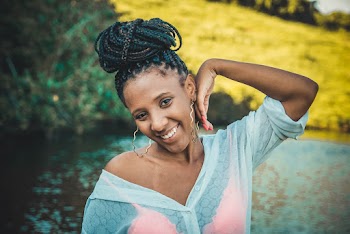 Woman With Dreadlocks Hair Touch Her Face