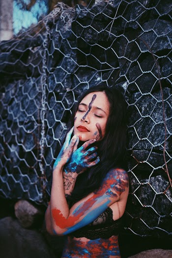 Woman With Face and Body Paint