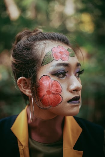 Woman With Face Art