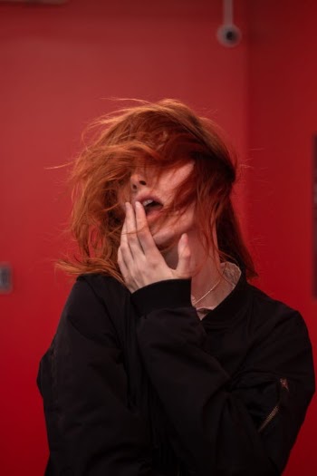Woman with Face Covered with Hair · Free Stock Photo