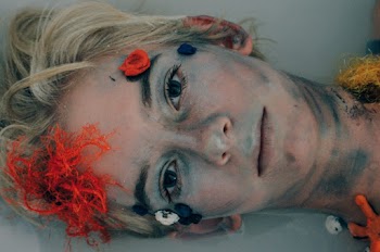 Woman With Face Paint on Her Face