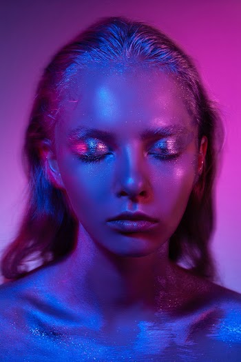 Woman With Glitters on Face and Body