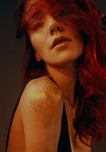 woman with glitters on her body
