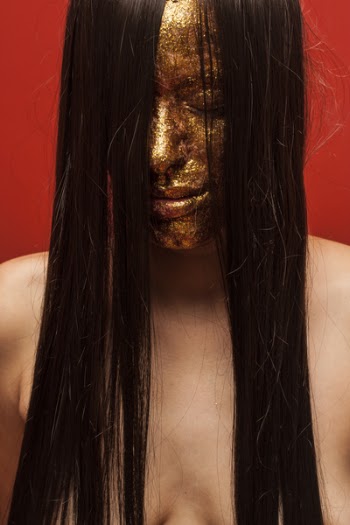 Woman With Gold Face Paint