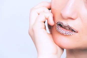 Woman With Gray Beaded Lipstick Close-up Photography