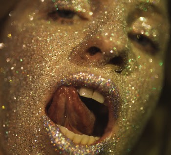 Woman With Gray Glitters on Her Face