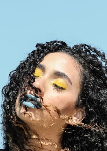 Woman With Gray Lipstick Closing Her Eyes