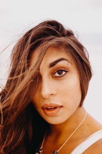 woman with hair covering her face