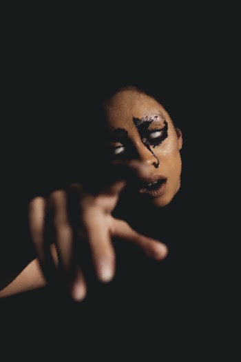Woman With Halloween Art on Her Face
