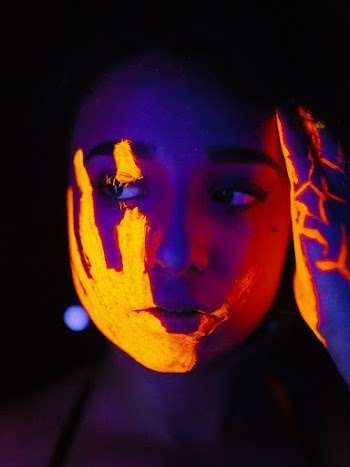 Woman With Hand Paint on Face