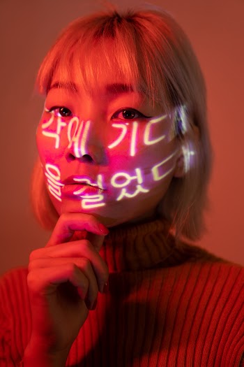 Woman With Light On Face 