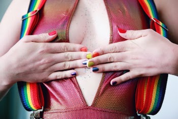 Woman With Multicolored Nail Polishes