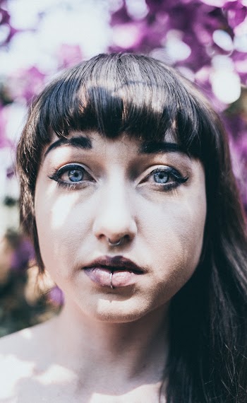 Woman With Nose Piercing Taking Selfie