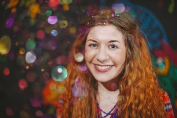 Woman With Orange Hair Smiling