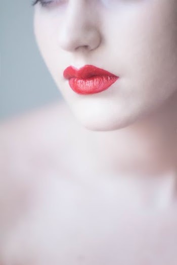 woman with orange lipsticks