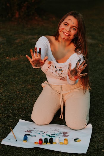Woman With Paint On Hands