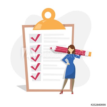 Woman with pencil standing at the big checklist