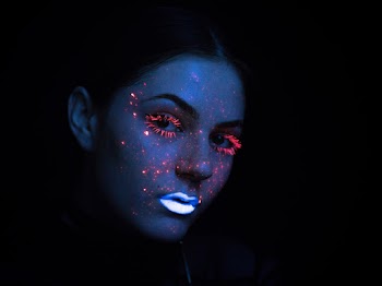 Woman With Pink Eyelashes and White Lipsticks