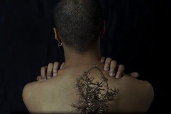 Woman With Plant on Back