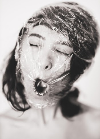 Woman With Plastic Bag on Her Head