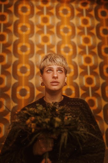 Woman With Short Chair Looking Up