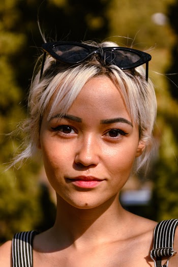Woman With Sunglasses On Her Head