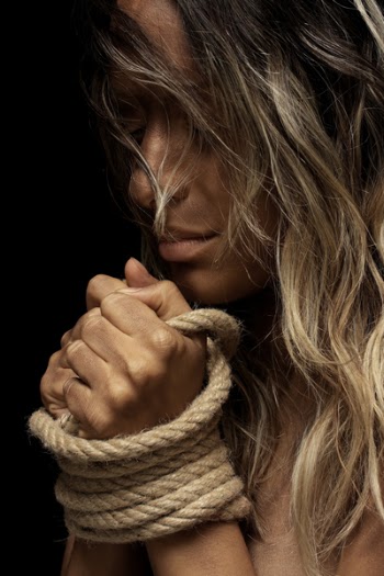 Woman With Tied Hands