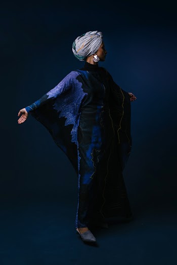 Woman With Turban And Tunic Dress