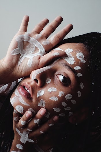 Woman With White Paint on Face