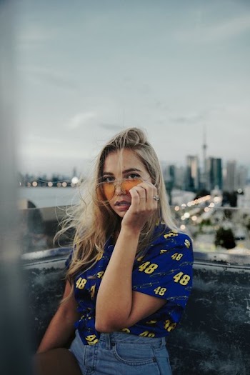 Woman With Yellow Glasses