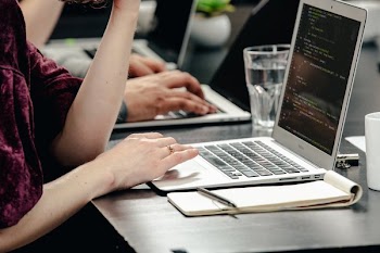 Woman Writing Code