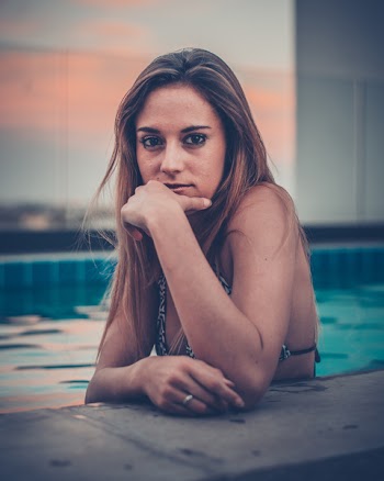 WomanIn Swimming Pool