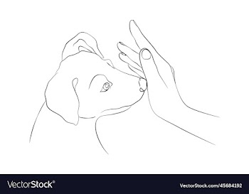 womans hand and muzzle of a puppy