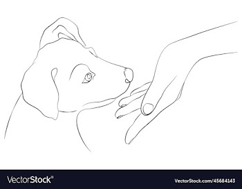 womans hand and muzzle of a puppy dog and human