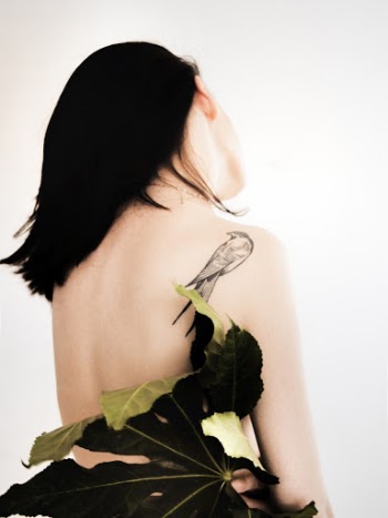 Women's Back with Tattoo