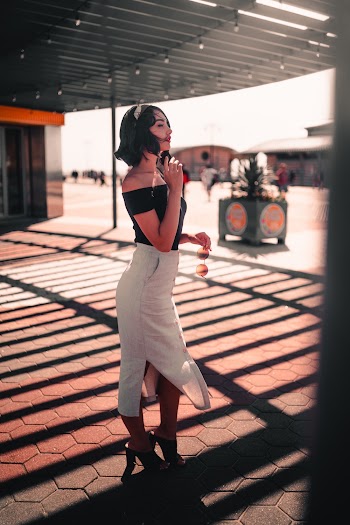 Women's Black Strapless Top and White Skirt