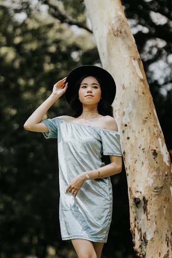 Women's Blue Off-shoulder Blouse Close-up Photography