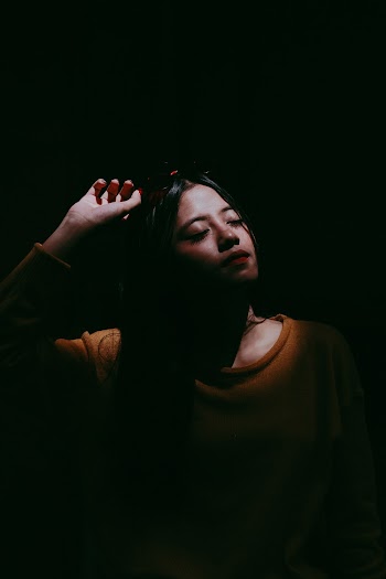 Women's Crew-neck Sweater With Lights on Her Face and Shoulder