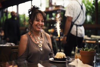 Women's Gray Off-shoulder Dress in Front of Cake