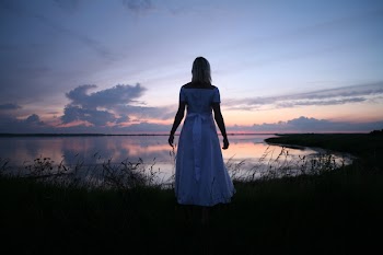 Women's in White Dress Near Body of Water