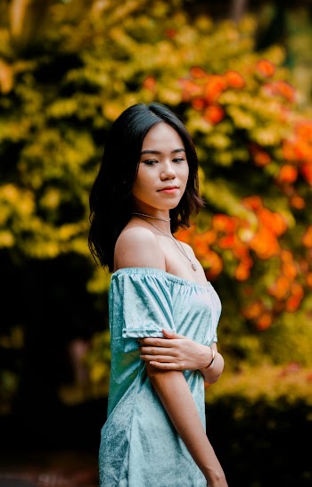 Women's Teal Strapless Dress Close-up Photography