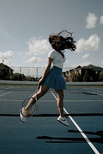 Women's White V-neck Shirt and Blue Miniskirt