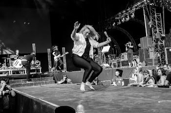 Women Dancing on Stage in Gray Scale Photography