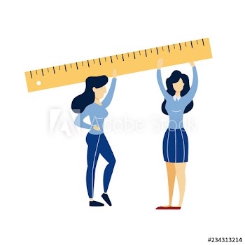 Women holding big ruler in the hands