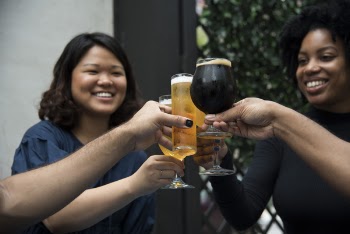 Women Holding Glasses Having Toasting