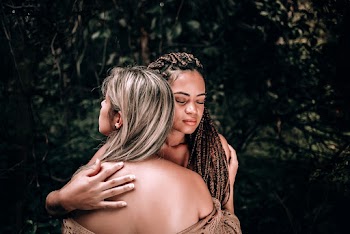 Women Hugging Each Other