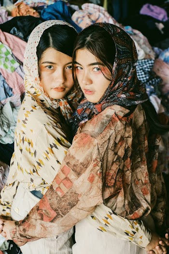 Women Hugging Each Other