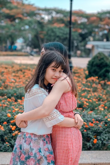 Women Hugging Each Other