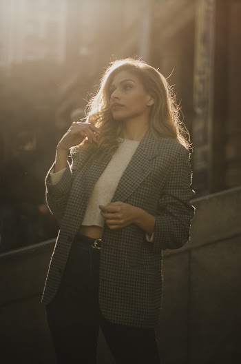 Women In Casual Wear Sporting A Gray Suit Jacket